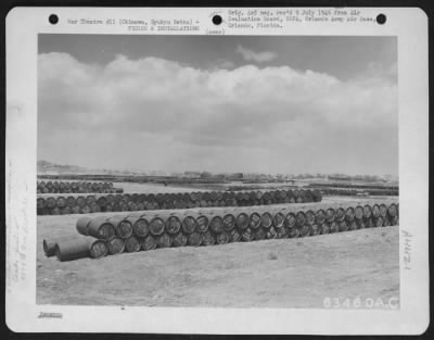 Thumbnail for Supplies > Rows Of Gas And Oil Drums In The Supply Area From Which They Were Issued By The 4474Th Qm Depot Company, And Formerly By The Bulk Service Battalion, Started 30 June 1945.  60-80 Octane Gase, And 10-30-50 Lubricating Oil Was Issued To All Outfits.  Okinawa