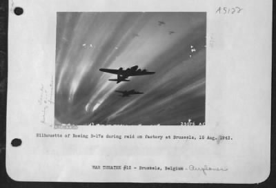 Boeing > Silhouette of Boeing B-17s during raid on factory at Brussels, 15 Aug. 1943.