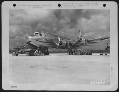 Thumbnail for General > A Douglas C-54 Of The Air Transport Command Receiving A 'Check Up', On Kadena Strip, Okinawa, Ryukyu Retto.  19 August 1945.