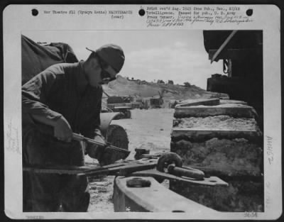 Thumbnail for Miscellaneous > To Keep Aviation Engineer Equipment Active On Airbase Construction 24 Hours A Day In The Ryukyu Retto, Trouble Shooters Like Cpl. Joe Sechen, Route 6, Muskegon, Michigan, Rush Out To The Coral Pits And Airstrips With Portable Repair Equipment.  Here Cpl.