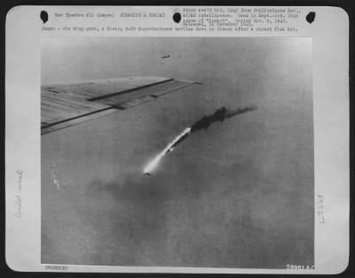 General > Japan - One Wing Gone, A Boeing B-29 Superfortress Hurtles Down In Flames After A Direct Flak Hit.