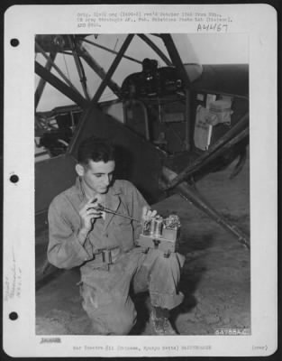 Thumbnail for Miscellaneous > Sgt. Robert Gelb, Brooklyn New York, Repairing Power Unit On Radio For Vultee L-5.  163Rd Liaison Squadron, Okinawa, Ryukyu Retto.