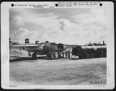 Thumbnail for Refueling > North American B-25 'Mitchell', 396Th Bomb Squadron, 41St Bomb Group, Being Rearmed And Fueled After A Bombing Strike Somewhere Over Kyushu, Japan.  29 July 1945.  Okinawa, Ryukyu Retto.