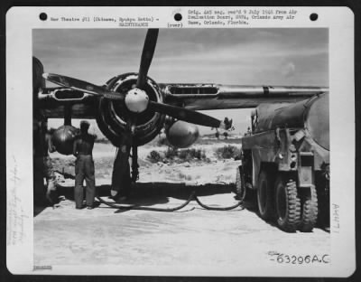 Thumbnail for Refueling > 418Th Night Fighter Squadron Northrop P-61 Being Refueled On Kadena Strip B.  The Plane Carried Four 165 Gallon Belly Tanks For Long Patrol Work, Averaging Approximately 7 1/2 To 8 Hours Flying Time With Four Tanks.