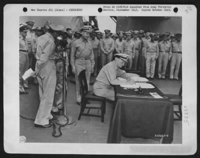 General > Fleet Admiral Chester W. Nimitz Signs For The United States During The Surrender Ceremonies On The U.S.S. Missouri In Tokyo Bay, August 31, 1945.  At The Microphone At The Left Is General Of The Army Douglas Macarthur.