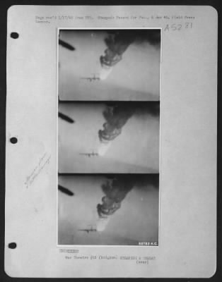 General > While attacking German armor and motor transport in Belgium, December 17, 1944, Major Buckingham Dalglish, Ninth Air force fighter-bomber pilot, encountered and destroyed an HE 111, recording the destruction on his gun sight camera. Photo shows smoke