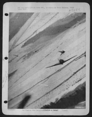 General > This unusual photograph of a Luftwaffe pilot jumping from his damaged plane was made by Major James Dalglish, Rome, N.Y., a U.S. 9th Air force fighter-bomber pilot, during a recent air battle over the Belgian Bulge. The enemy pilot deserted his ship