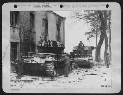 General > These two German "flak wagons" shuttled through the Ardennes as part of the greatest concentration of mobile anti-aircraft weapons of the war until 9th AF fighter-bombers silenced them during recent fighting in the Belgian Bulge. Surmounting heavy