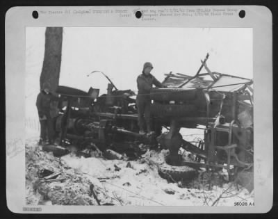 General > This German truck was transporting a load of ammunition for von Rundstedt's forces in the Belgian Bulge, when 9th Air force fighter-bombers spotted the vehicle and left it in this condition a few miles north of Houffalize, Belgium.