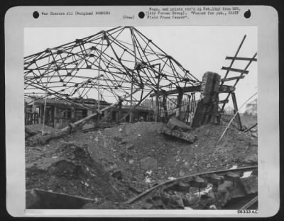 General > A tram car terminal used by the Germans during their withdrawal along the Belgium-German border, as it appeared after an attack by 9th AF fighter-bombers. The versatile Republic P-47 Thunderbolts of the 9th AF daily perofrm a variety of tactical