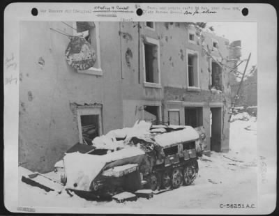 Thumbnail for General > A German half-track destroyed in Houffalize, Belgium, object of repeated bombardments by 9th AF medium, light, and fighter-bombers before the Germans withdrew from their important communications center.