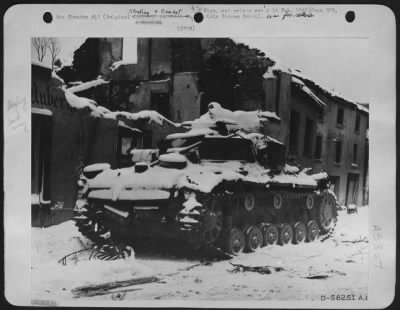 Thumbnail for General > A Panther tank destroyed in Houffalize, Belgium, object of repeated bombardments by 9th AF medium, light and fighter-bombers before the Germans withdrew from their important communications center.