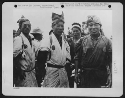 Thumbnail for General > Close-Up Of The Okinawa Boatmen - This Picture Shows The Native Costume Worn By The Boatmen Who Participate Annually In The Race On The East China Sea In Honor Of An Ancient King Who Wasn'T Quite As Wise As His Youngest Daughter.  The Two On The Left, Mem