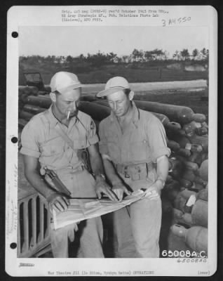 Thumbnail for General > Commanding Officer Of The 364Th Service Group And Deputy Commander Of The 318Th Fighter Group, Conferring Over Map.  Left To Right: Lt. Colonel H.M. Cox, 922 West End Place, Knoxville, Tennessee And Lt. Colonel Charles L. Musgrave, 1155 Sherman, Denver, C