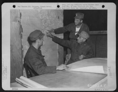 General > Men Of The 1181 Engineering Construction Group, 1878Th Engineering Aviation Battalion, Discuss The Layout Of Futema Airfield On Okinawa, Ryukyu Retto.  1945.