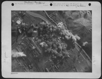 Charleroi > A U.S. 9TH AF BOMBER STATION, ENGLAND. A bomb strike photograph taken during the attack by U.S. 9th AF B-26 Marauders on the Charleroi/Montignies railway marshalling yards April 11th. The bomb concentration covers the entire yards, with hits among