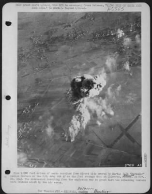 Chievres > This 4,000 ofot column of smoke resulted from direct hits scored by Martin B-26 "Marauder" medium bombers of the U.S. Army 8th AF on the fuel storage dump at Chievres, Belgium, on Nov., 29, 1943. The concussion resulting from explosion was so great