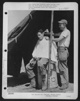 General > Cpl. Crum, Member Of The 443Rd Engineer Aviation Battalion, Trimming Gis Hair During His Off-Duty Hours.  Okinawa, Ryukyu Retto.  April 1945.