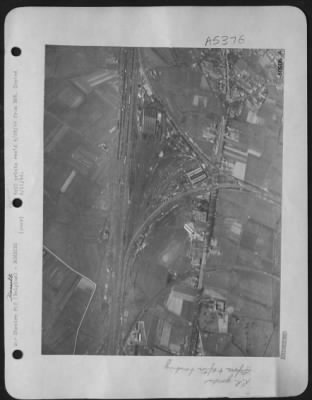 Hasselt > Seconds before Marauder bombs fell on the important railway marshalling yards at Hasselt, 40 miles east of Brussels, April 8, 1944. Nazi war goods were still flowing through this main junction on the Antwerp-Maastricht-Anchen line. Then bombs