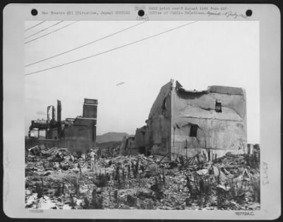 Hiroshima > Pacific Air Command, U.S. Army, 3 August, 1946 - One Year After The Dropping Of The First Atomic Bomb On Hiroshima, Japan, The Skeletons Of A Few Sturdy Buildings Remain Standing, Their Strong Sides Crushed In By The Force Of The Blast.  The City Is Still