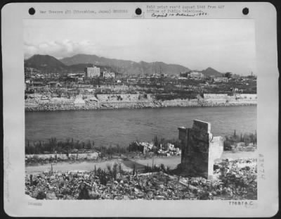 Hiroshima > Pacific Air Command, U.S. Army, 3 August, 1946 - Looking Across One Of The Rivers That Flow Through The Ruins Of Hiroshima, Japan, The Awe Inspiring Sight Of Such A Large City Almost Completely Demolished By One Atomic Bomb Seems Unbelievable.  The Barren