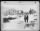 Maj. Gen. E.R. Quesada, whose 9th Tactical Air Command pilots played a principal role in driving the Germans from St. Vith, Belgium, inspects a bomb crater in the village with his chief of combat operations, Col. Gilbert Meyers, left. Gen. Quesada's - Page 1