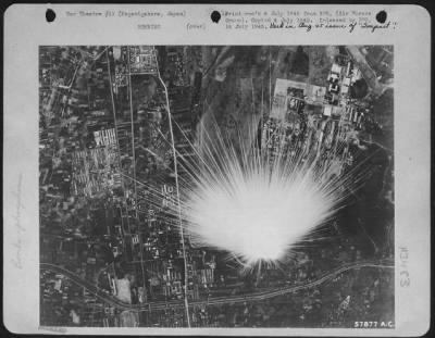 Kagamigahara > A Japanese Phosphorous Bomb Explodes Beneath Boeing B-29'S Of Major General Curtis E. Lemay'S 21St Bomber Command During A Recent Mission Over Kagamigahara, Japan, Site Of A Huge Air Depot Approximately 30 Miles North Of Nagoya.  Two Large Plants Of The K