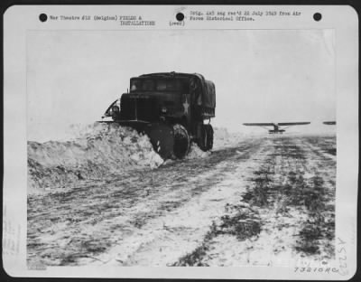 General > One Of The Duties Of The 925Th Engineer Regiment, 9Th Engineer Command, Is To Keep Runways Clear For Operational Use.  Here, A Snow Plough Removes The Snow From A Cub Strip Somewhere In Belgium.  12 January 1945.