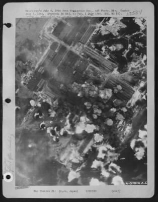 Kure > A Direct Hit On The Stern Of A Jap Battlehip Of The Kongo Class Was Made, As Other Bombs Burst On Japanese Naval Installations At Kure, Japan, During The Strike Of June 22, 1945, By B-29 Superfortresses Of Major General Curtis E. Lemay'S 21St Bomber Comma