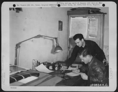 Thumbnail for General > Officers Of S-2 (Intelligence) Attached To The 386Th Bomb Group At St. Trond, Belgium, Plan The Next Mission Against The Enemy In Europe On 7 May 1945.