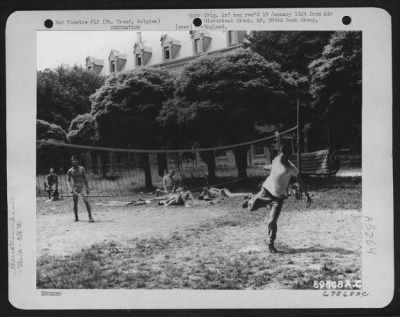 Thumbnail for General > Men Of The 386Th Bomb Group Step Lively During A Tennis Match At Their Base  In St. Trond, Belgium On 26 June 1945.