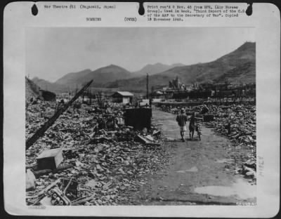 Nagasaki > At Nagasaki, Japan Only Rubble Remains Near The Point Where The Atomic Bomb Was Dropped.  Nagasaki Was So Pulverized That Only A Few Shacks Could Be Rebuilt Out Of Debris.