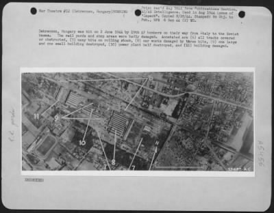 Debreczen > Debreczen, Hungary was hit on 2 June 1944 by 15th AF bobmers on their way from Italy to the Soviet bases. The rail yards and shop areas were badly damaged. Annotated are (6) all tracks severed or obstructed, (7) many hits on rolling stock, (8) car