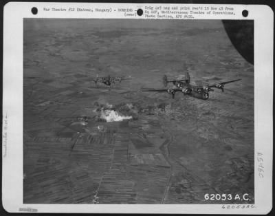 Hatvan > Bombing Of Hatvan, Hungary, By Consolidated B-24 "Liberators" Of The 15Th Air Force, On 20 September 1944.  Two Of The "Liberators" Shown Leaving The Smoking Target.