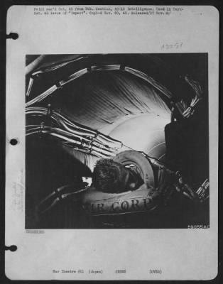 Thumbnail for General > A Catnap During A Long Mission Is Taken By A Crew Member, Wearing Mae West, In The Long Tube That Connects Pressurized Compartments In A B-29.