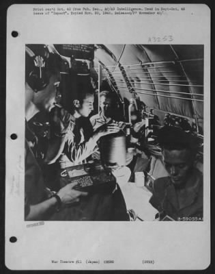 Thumbnail for General > Japan - Meal Time Aboard This B-29, With Trays Of Vegetables, Was Fancier Than Usual.  Generally, Crews Were Given Sandwiches, Cans Of Juice, Gum, Candy.  They Brought Their Own Peanuts.