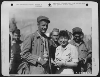 Thumbnail for General > American Army Nurse, Lt. Eleanor Pope, From Girard, Ohio, Of The 42Nd General Hospital, Greets An American Prisoner Of War, Cpl. Orman Jacques From Glendale, Calif., Who Was Imprisoned At Toyama Camp #7.  Dock Area, Yokohama, Japan.  September 1945.