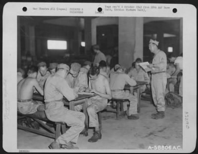 Thumbnail for General > Released Prisoners Of War Being Processed By Recovered Personnel Team Number 68 At Yokohama Docks Before Boarding Hospital Ship.  Japan, September 1945.