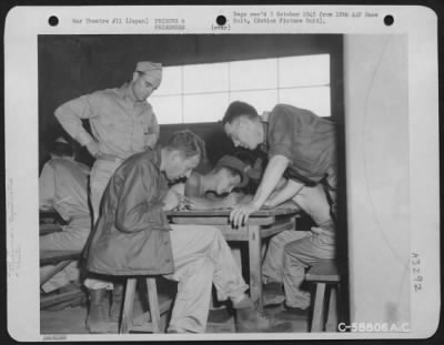 Thumbnail for General > Released Prisoners Of War Being Processed By Recovered Personnel Team Number 68 At Yokohama Docks Before Boarding Hospital Ship.  Japan, September 1945.