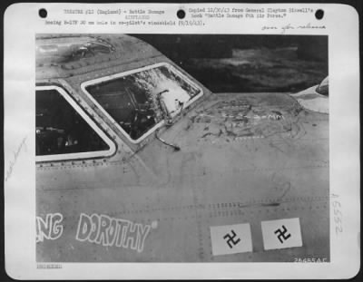 Thumbnail for Battle Damage > Boeing B-17F 20 mm hole in co-pilot's windshield.