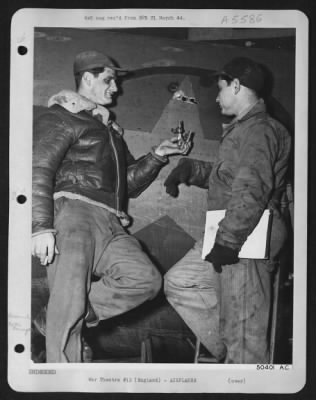 Battle Damage > S/Sgt Guy T. Hiatt, Covington, Ky. Left waist gunner on "Idiot's Delight" flying his 21st mission, was saved from serious injury when a piece of flak over Berlin hit the ammunition belt of his gun. One 50 cal bullet was exploded and another badly