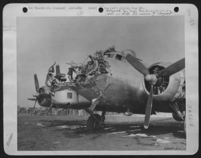 Battle Damage > ENGLAND-1st Lt. Lawrence M. De Lancey, Corvallis, Oregon, landed this Boeing B-17 Flying ofrtress safely after its nose was literally shot away by flak over Cologne, Germany.