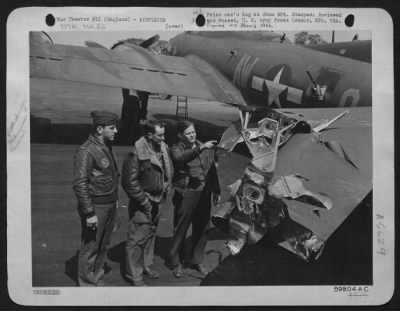 Battle Damage > The Three Airmen Who All Alone Brought The 8Th Air Force Boeing B-17 "Flying Fortress" 'Reluctant Dragon' Home From A Bombing Attack On War Plants In Berlin, After Six Of The Crew Bailed Out And The Remaining Man Was Killed At His Guns, Survey The Jagged