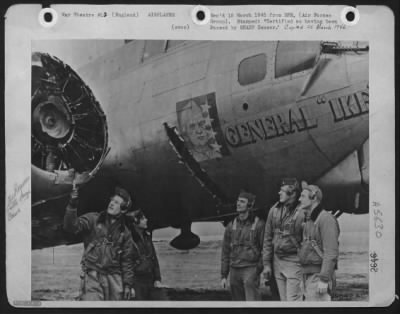 Battle Damage > Crew Members Inspect The First Major Battle Damage Suffered By This B-17 "Flying Fortress" In 65 Missions.  One Of The Giant Three-Bladed Propellers Was Torn Off From Its Hub By A Near Miss Flak Burst On A Recent Bombing Mission Over Germany.  The Heavy B