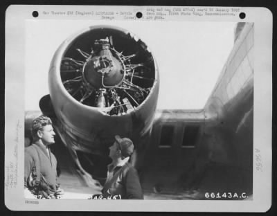 Battle Damage > Lt. Brashere And S/Sgt. Edwards Examine A Boeing B-17 "Flying Fortress" Engine That Was Damaged During A Mission Over Enemy Territory.  381St Bomb Group, England, 24 March 1945.