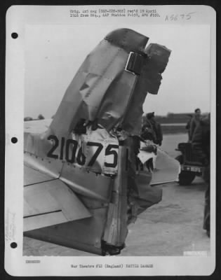 Battle Damage > North American P-51 (A/C 2106751) Of The 353Rd Fighter Group Returned To Its Base In England With A Damaged Tail Section Resulting From Aerial Combat.  11 March 1945.