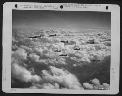 Boeing > Formations Of Boeing B-17 "Flying Fortresses"Fly Above A Cloud Formation While On Practice Bombing Mission Over Molesworth, England.  6 September 1943.