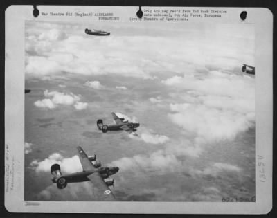 Consolidated > Consolidated B-24 "Liberators" Of The 2Nd Bomb Division, 8Th Air Force, Enroute To Bomb Enemy Installations Somewhere In Europe.  24 November 1943.  392 Bomb Group.