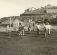 troops playing volleyball on Adak Island in August 1943