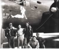 Dino is standing left in dark jacket with the B-25 Peg O' My Heart